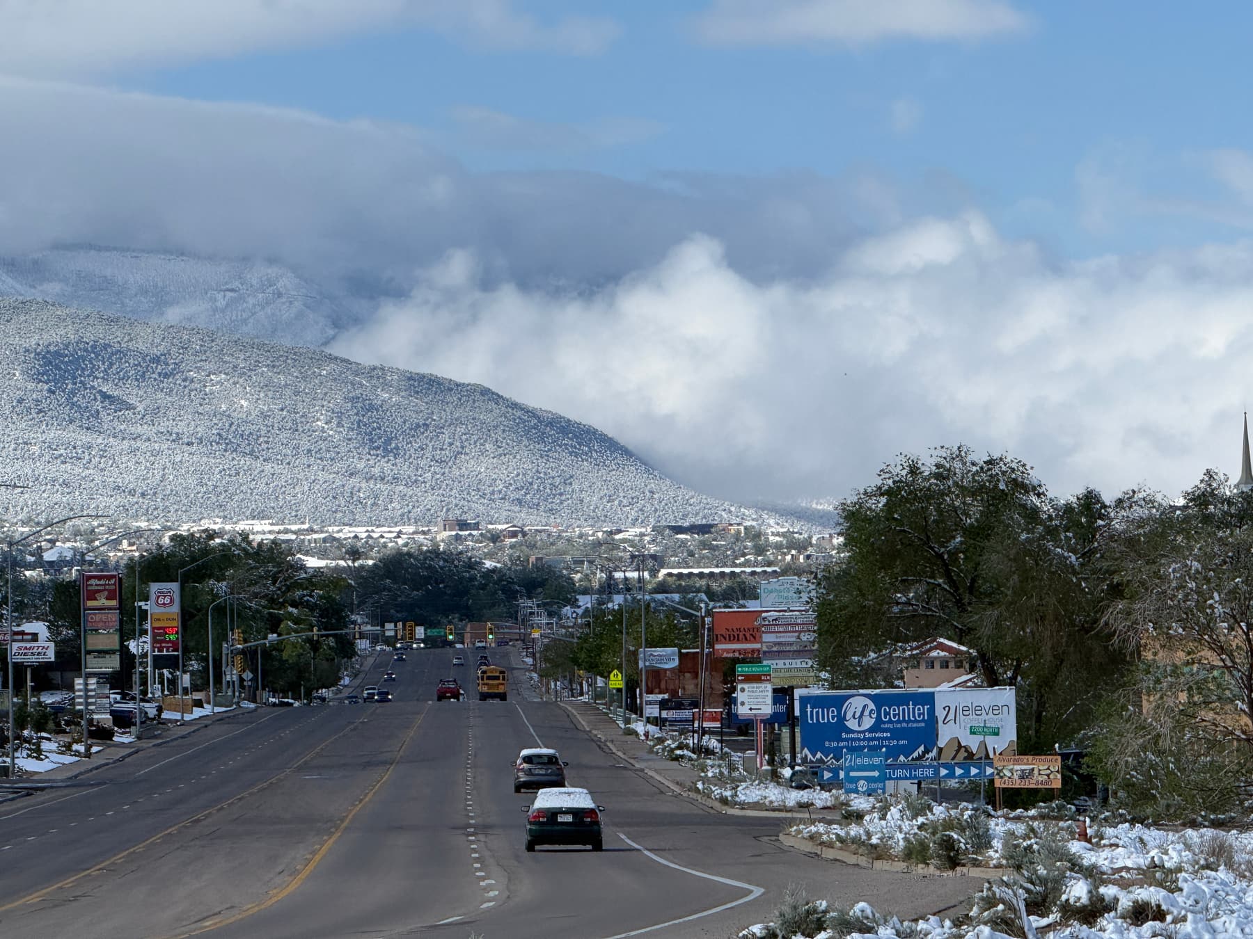 Cedar City street with snowy mountains in the background